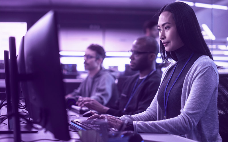 woman working on computer in office setting