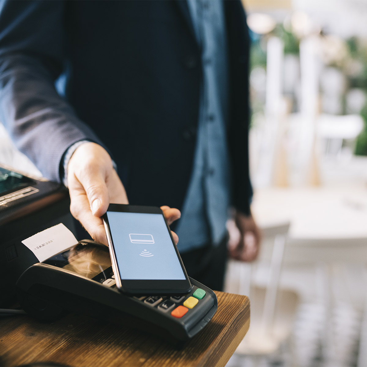 man using mobile payment